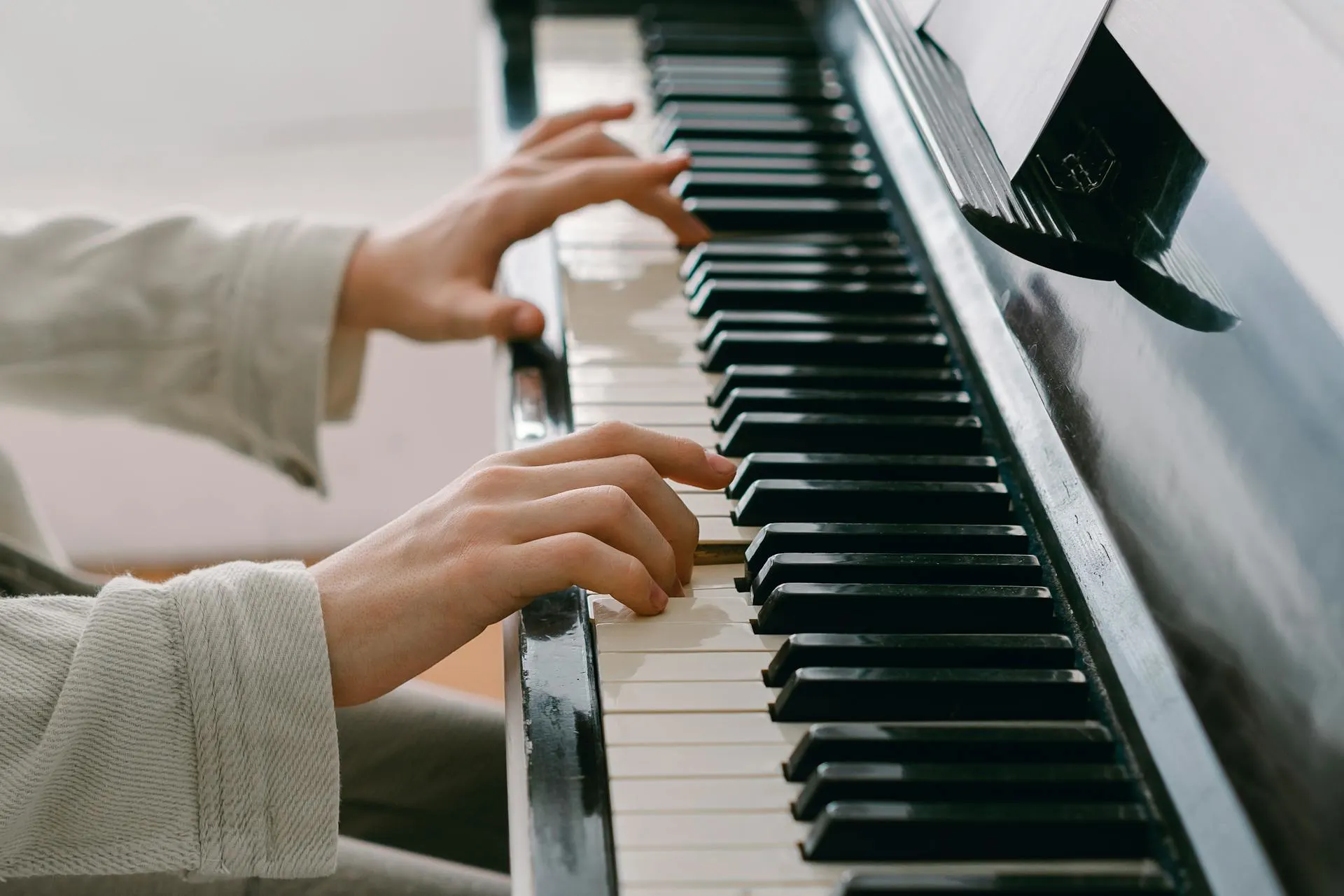 Image of a student at the piano